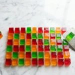 Colorful cut Knox Blox gelatin squares on marble